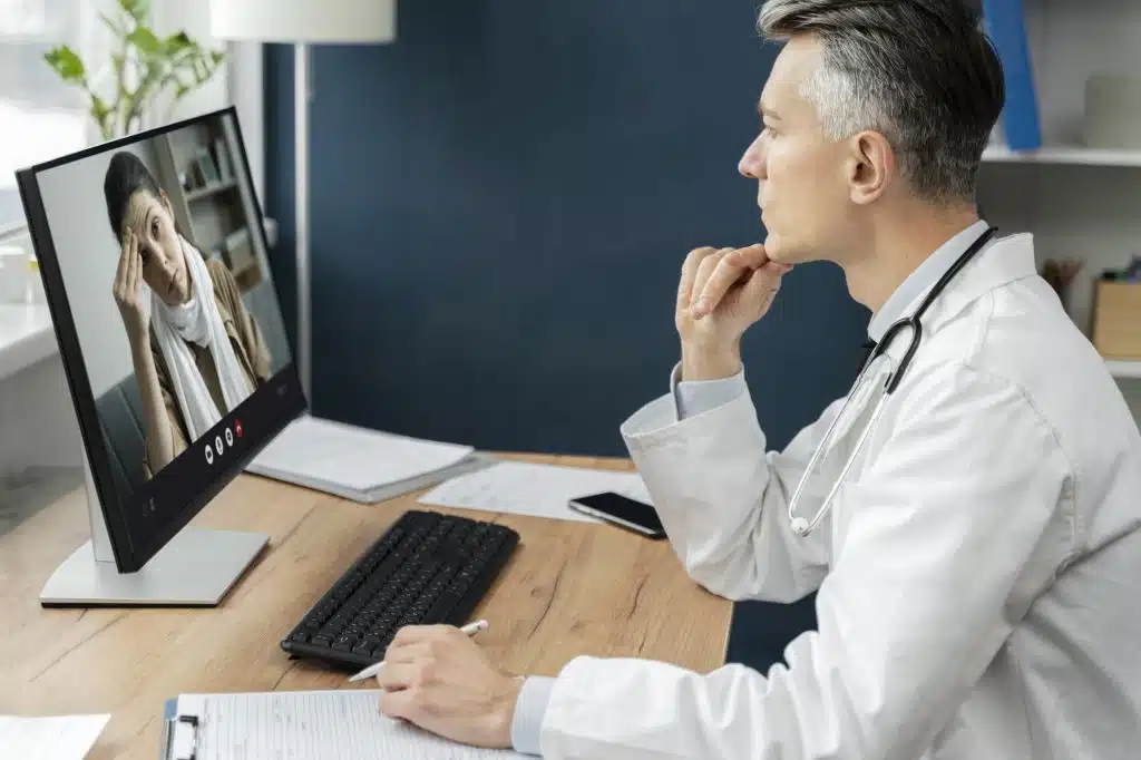 medical assistant virtual jobs-doctor talking to client
