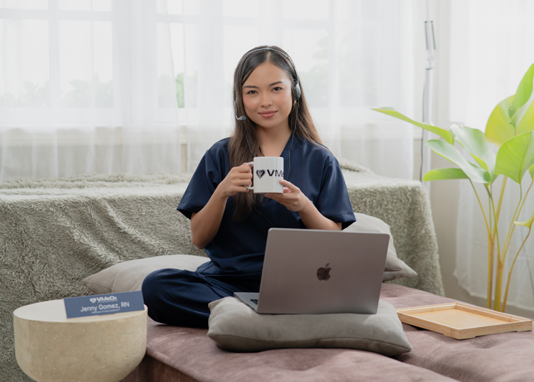 About-Us A female virtual medical billing assistant holding a cup of coffee