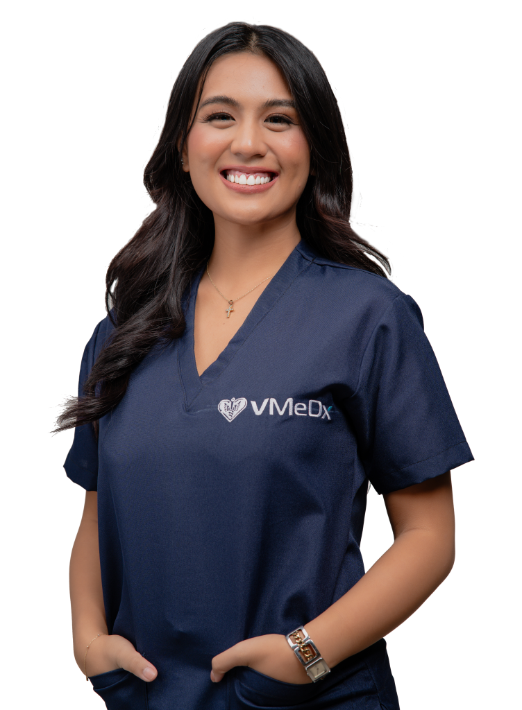 VMeDx virtual medical assistant wearing scrub and smiling with hands on the pocket