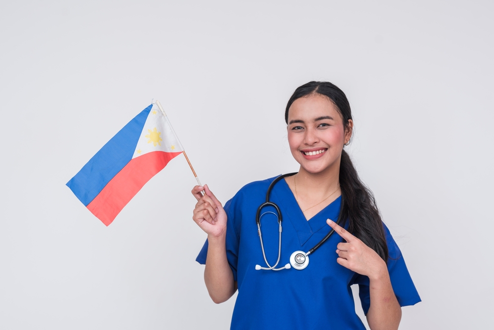 filipino virtual medical assistants holding a philippine flag