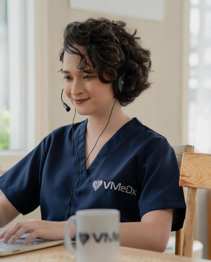 VMeDx Virtual medical scribe working on the table.
