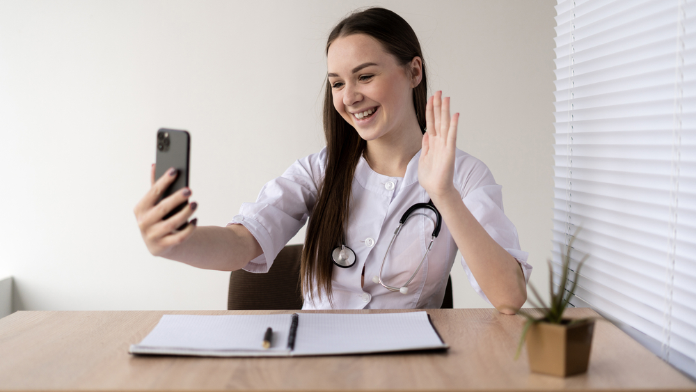 a female receptionist saying goodbye to her client on the phone.