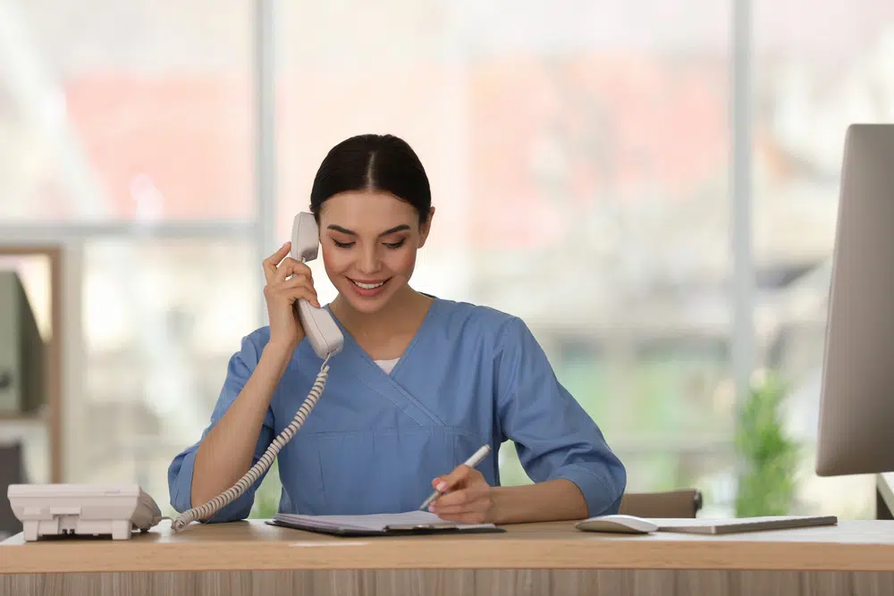 Virtual medical scribe taking a call at home.