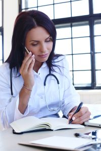 doctor equipping the stethoscope
