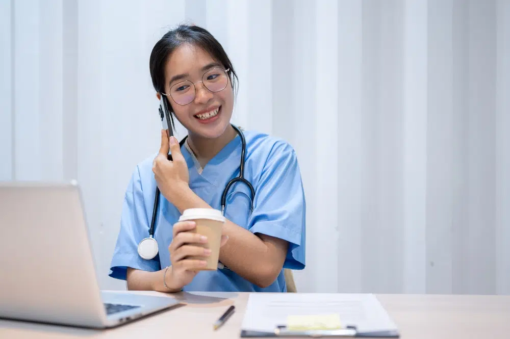A,Positive,,Hardworking,Asian,Female,Doctor,Is,Multitasking,,Talking,On