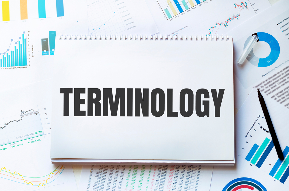 Notebook with Tools and Notes with text TERMINOLOGY