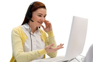 benefits of virtual receptionist working woman with headphones on
