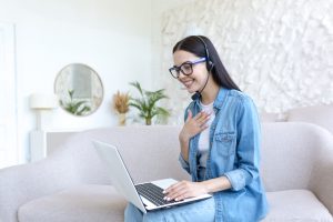 virtual receptionist working at the comfort of her home