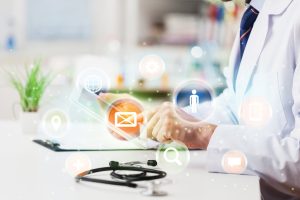 Doctor,At,Hospital,Working,With,Digital,Tablet,Pc, social media in healthcare 