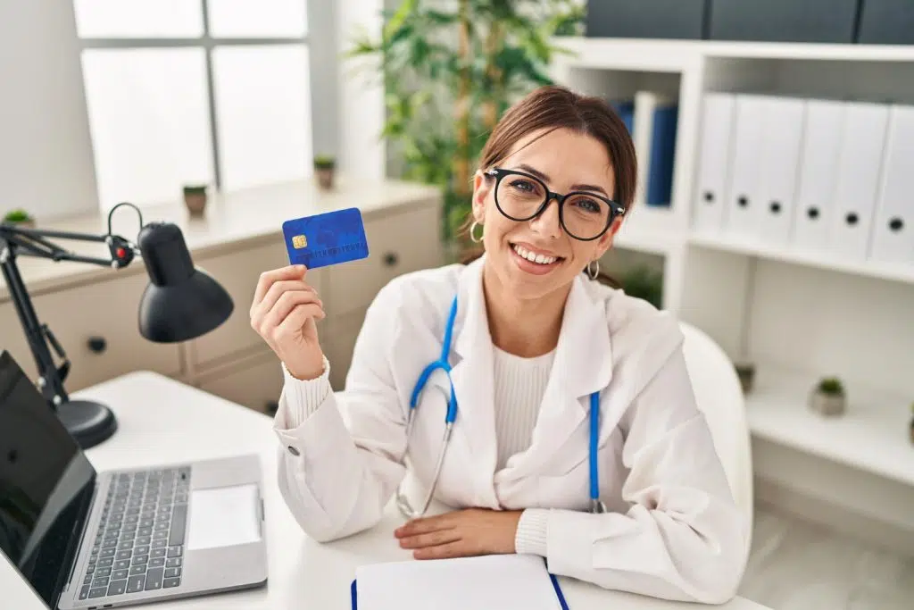 Professional female VA at work in a clinic -explore virtual medical assistant salary.