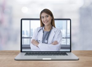 female doctor on a laptop,