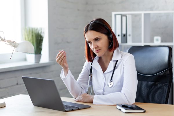 woman doctor giving her client a consult service as a medical virtual assistant