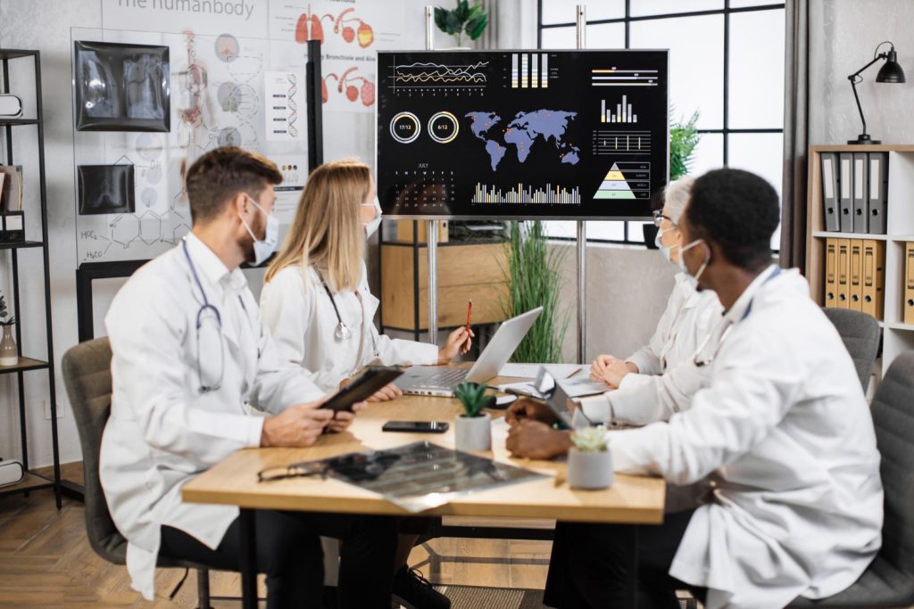 Boardroom discussion with a medical SEO company.