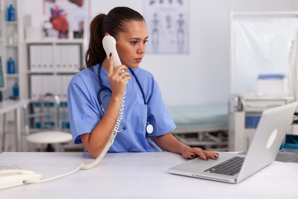 Medical transcriptionist answering phone calls