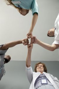 Close up on team of health workers, thanksgiving efficiency receptionist