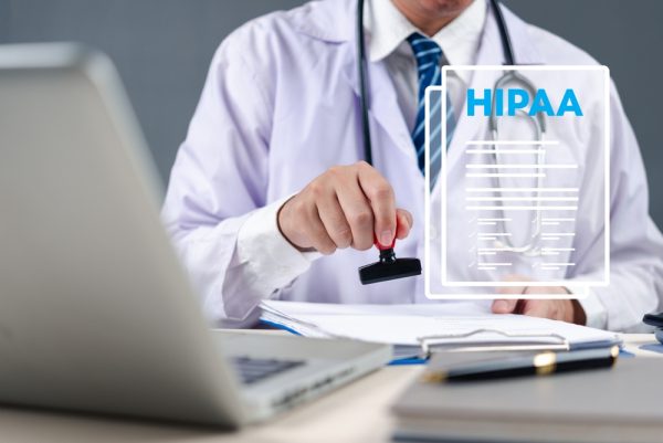 doctor in a white coat stamping medical documents with a HIPAA compliance digital icon overlay. The concept of healthcare data security, patient privacy protection, and electronic medical records, virtual medical message management
