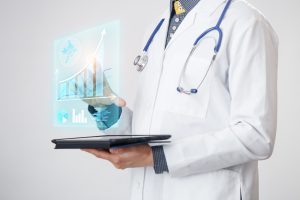 Doctor interacts with virtual screen of new technology for medicine. Technological innovation and medicine concept