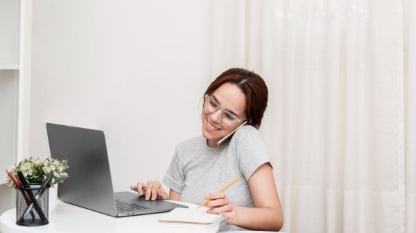 A girl virtual medical assistant using her laptop while on call