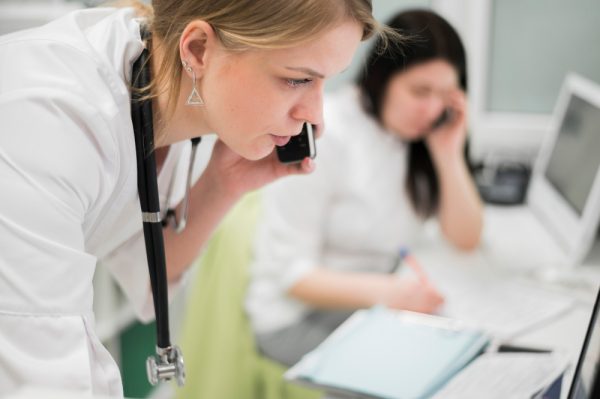 Best virtual assistant services for medical practice assisting a patient over the phone