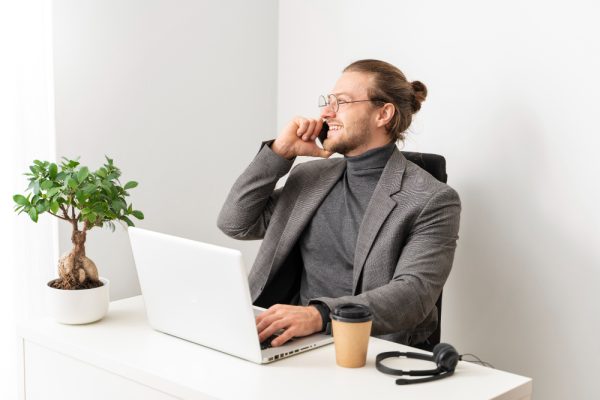 Man cold calling his client over the phone