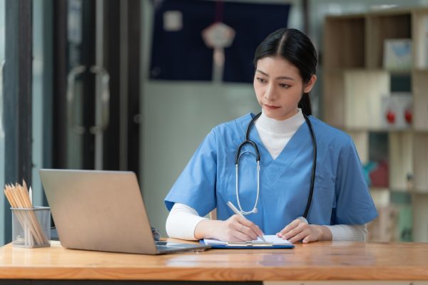 Patient coordinator job description, assisting with hospital paperwork and managing authorizations in an office setting.