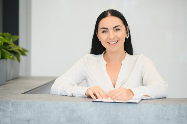 Pretty medical receptionist at work