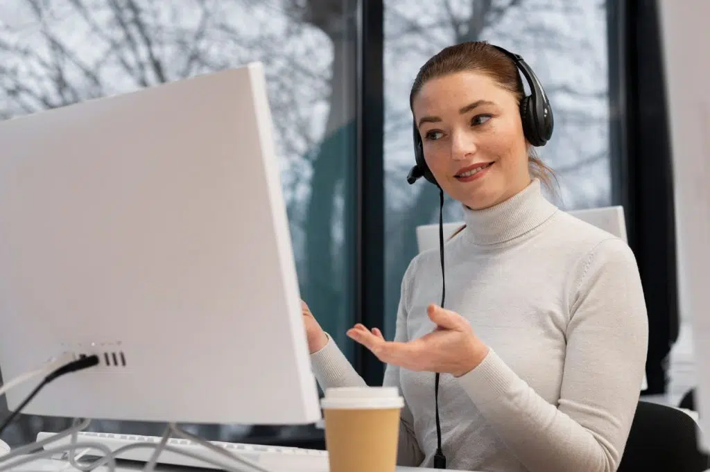 Virtual assistant with no experience talking with clients using headphones and microphone.