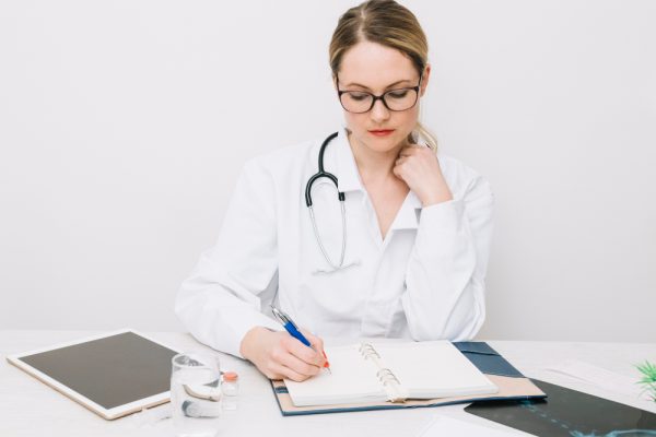 Virtual medical scribe working at the office.