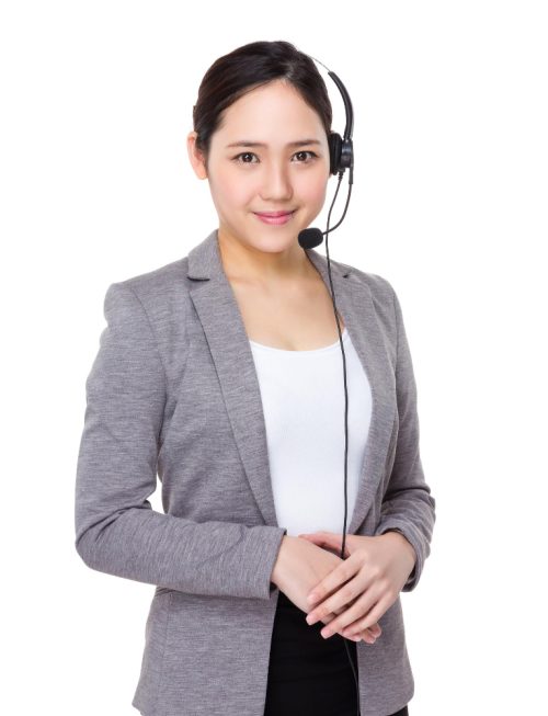 Women with headset on the head standing