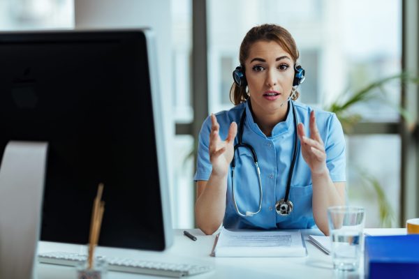 healthcare-expert-wearing-headset-while-working-virtual-assistant-for-medical-practice-giving-instructions-patients