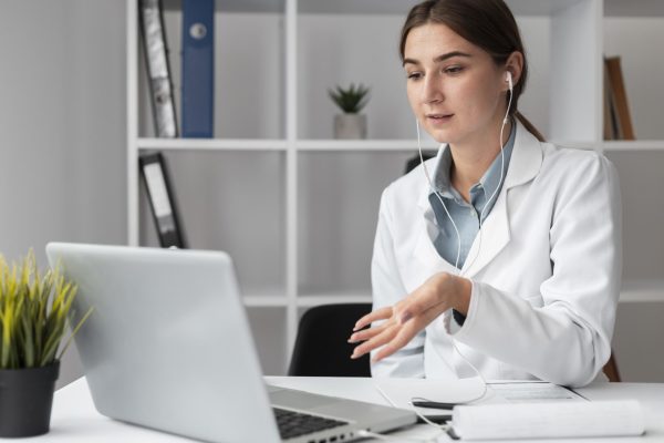 portrait-doctor-video-conferencing-clinic-virtual-assistant-for-medical-practice